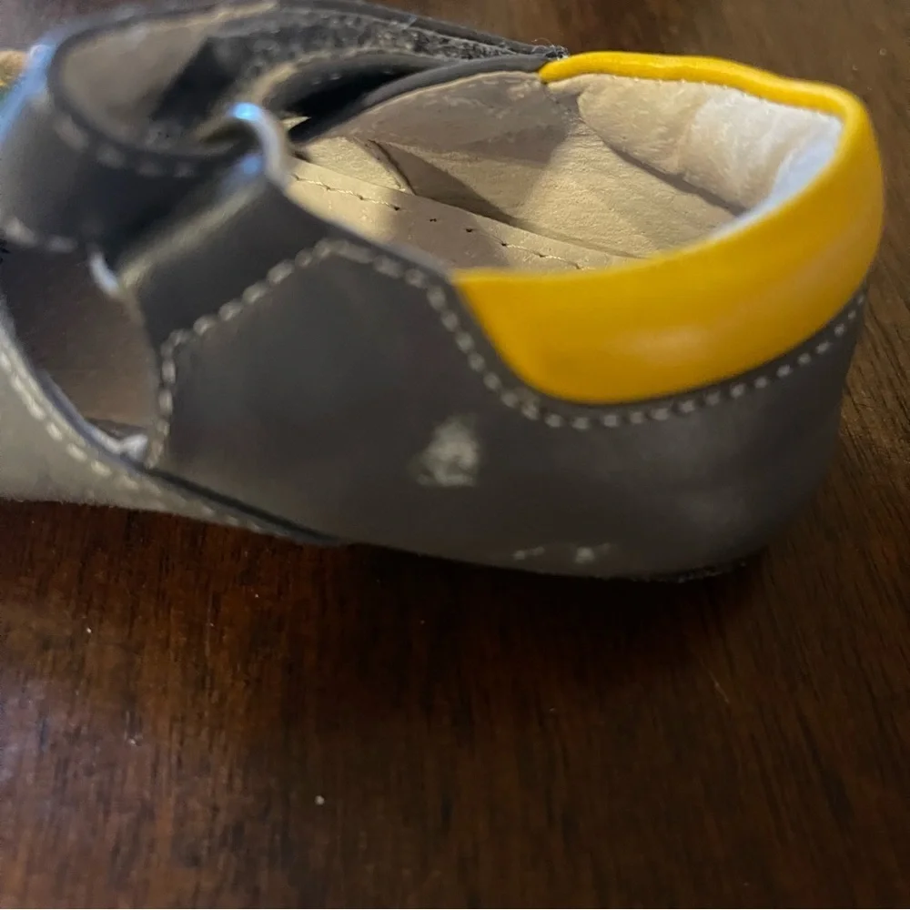 Gray Baby Shoes with Yellow Flower Accent